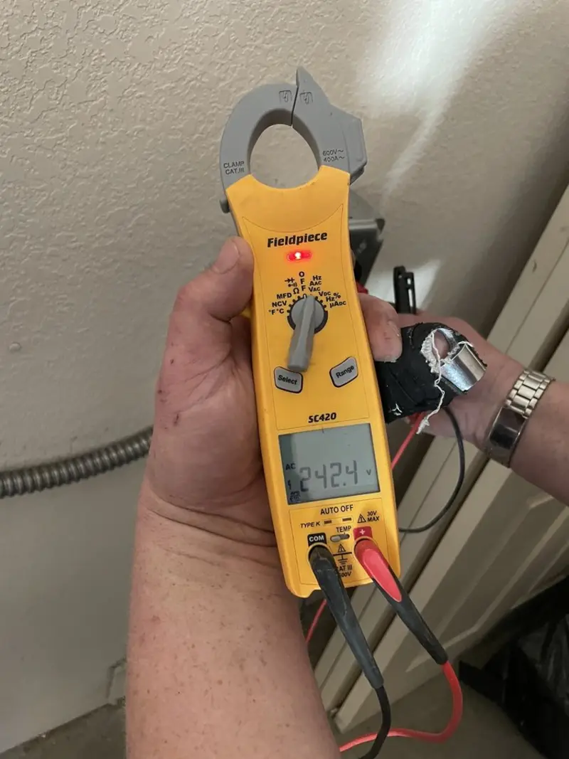 Voltage testing with clamp meter during Circuit Breaker Repair in Page